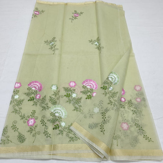 “Pastel Green Kota Cotton Saree with Floral Embroidery”