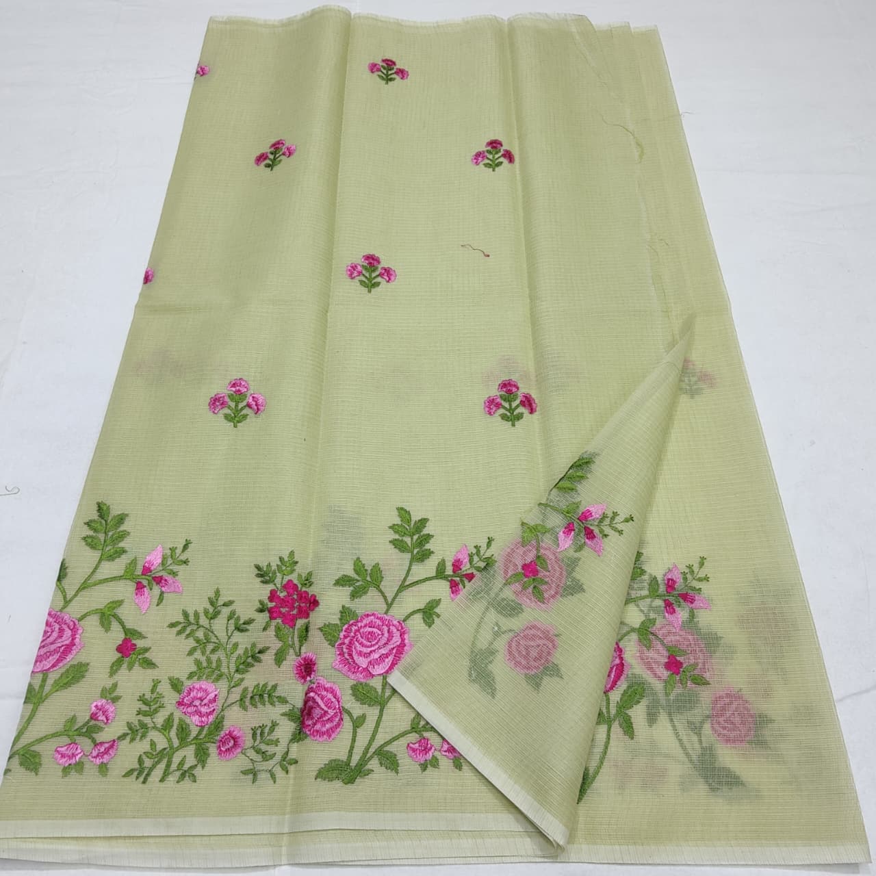 “Pastel Green Kota Cotton Saree with Floral Embroidery”